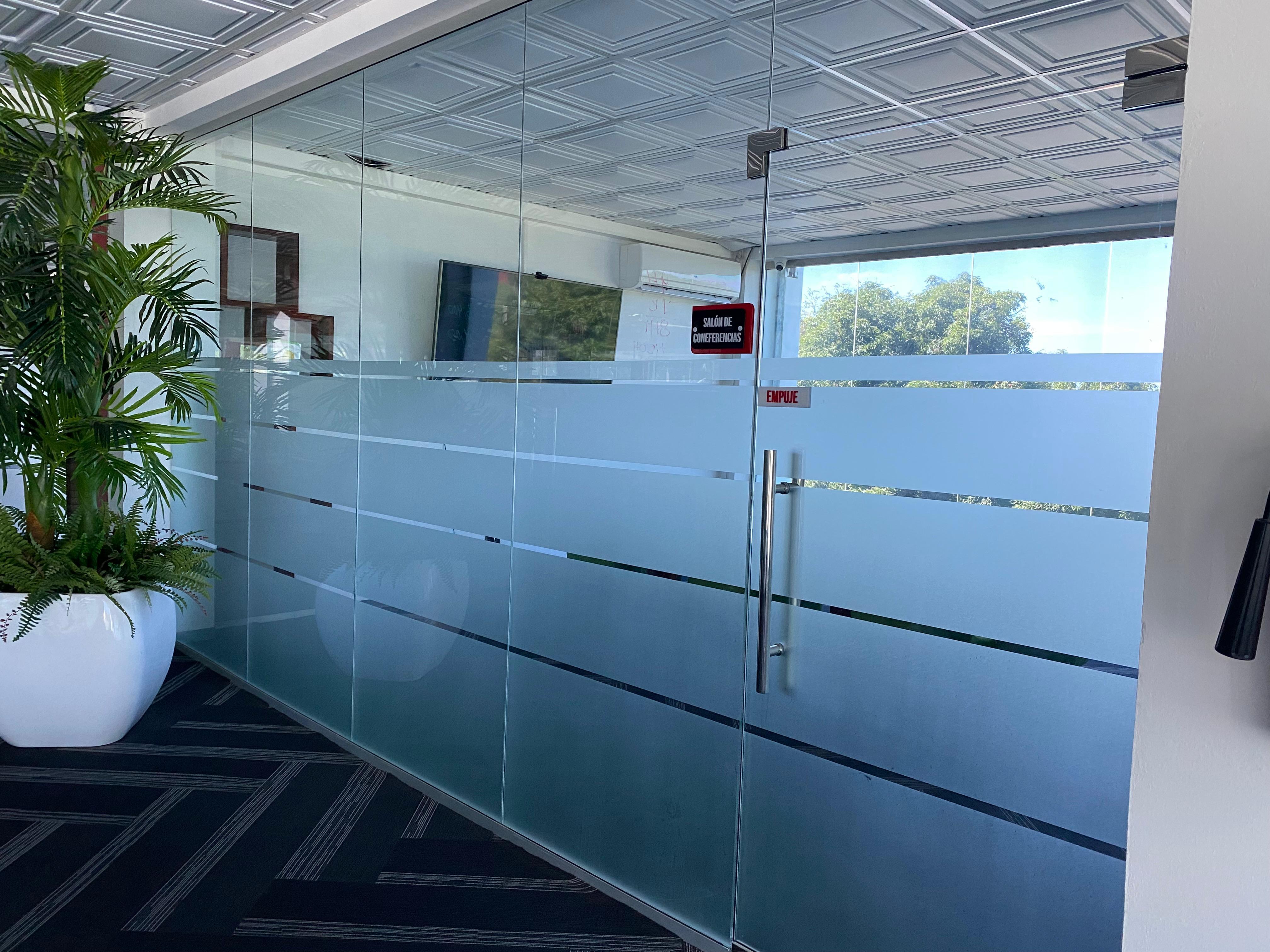 Glass corridor with plants